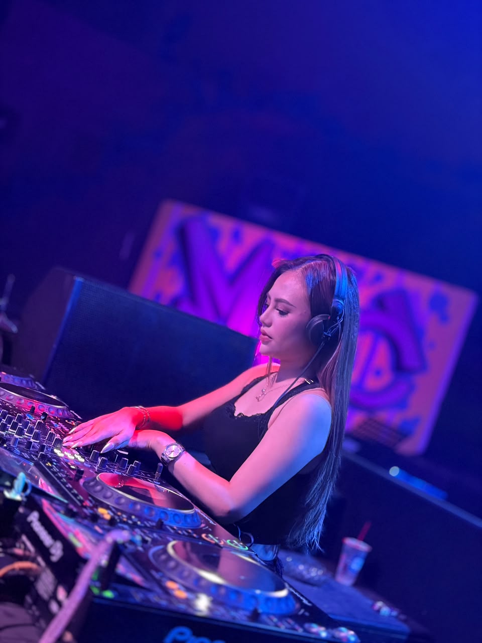 DJ WHY.D performing in a nightclub